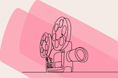 Image d'une caméra sur fond rose